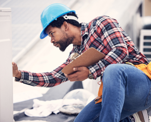 Technician, clipboard or air conditioning inspection on rooftop for safety, power or maintenance