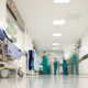 Workers in hospital corridor